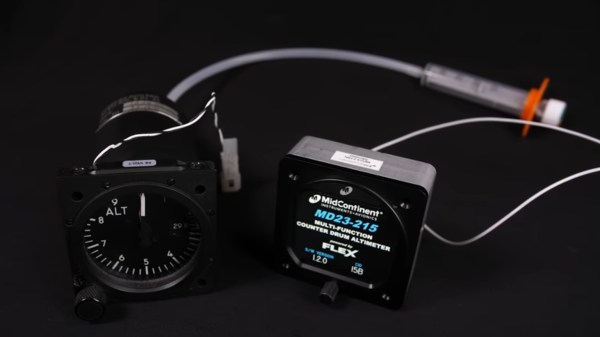 A photo of the old mechanical and new digital altimeters