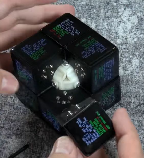 The 2022 preproduction WOWCube with a block removed. (Credit: MetalJesusRocks, YouTube)
